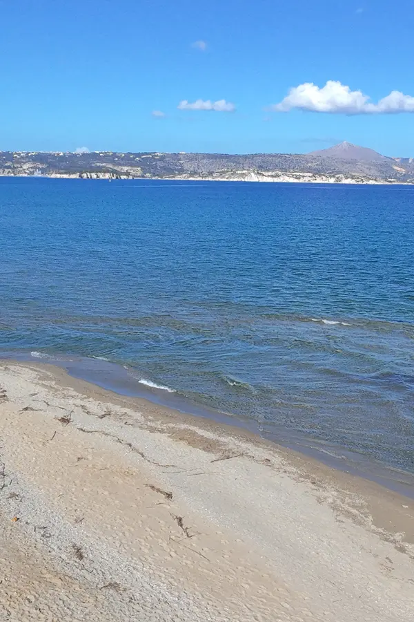 Pristine white sands and clear azure waters define Kiani Akti Beach in central Crete.